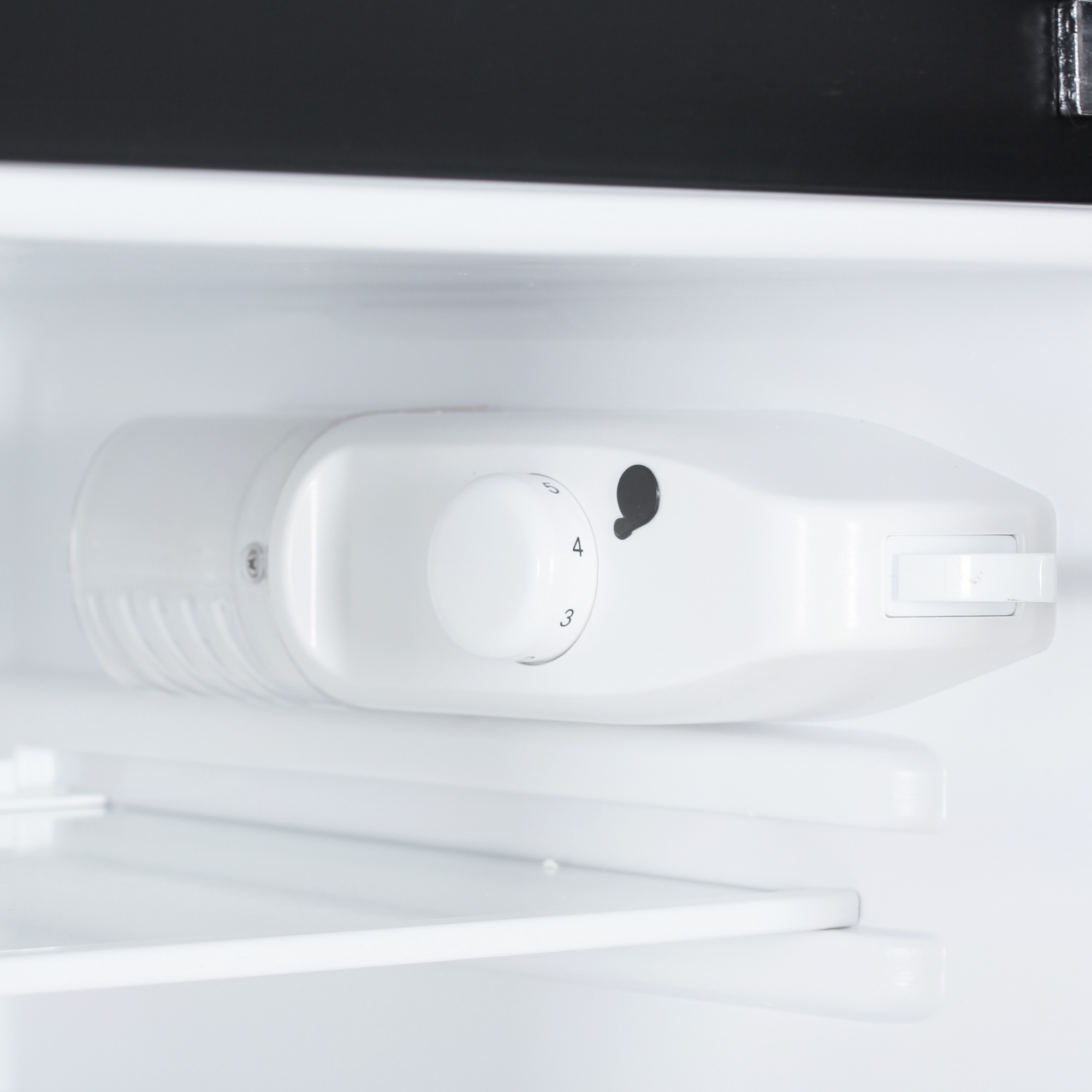 9057384 Холодильник компактный   Tesler RT-132 черный STDN-0129360 - Вид №11