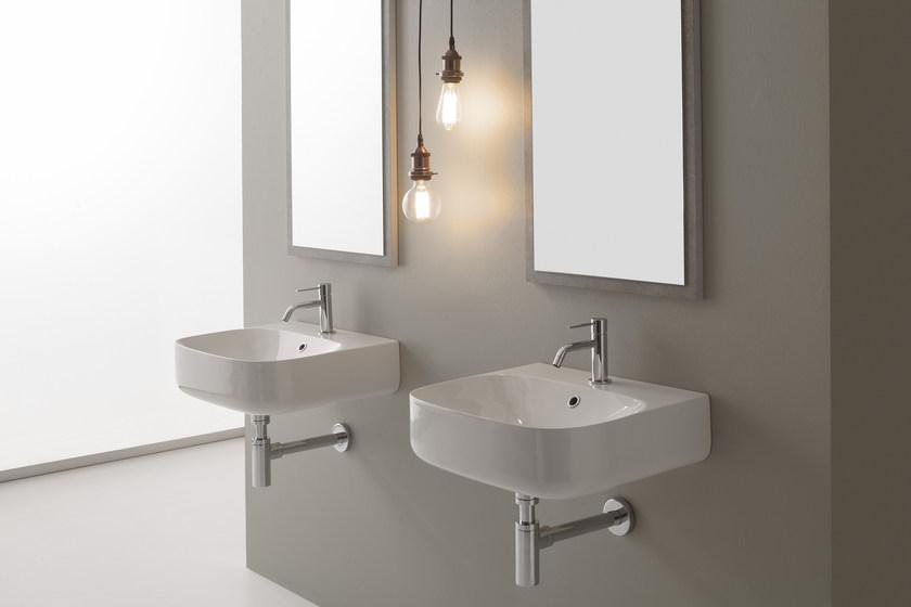 Подвесная раковина настенная овальная Scarabeo Ceramiche Moon белая sun-id-1500165 - Вид №1