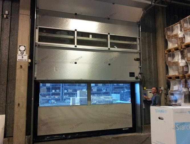 ASSA ABLOY Секционные ворота Applicazioni esterne sun-id-1397826