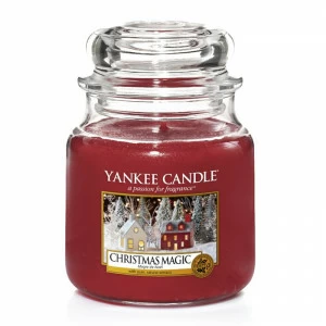 Свеча средняя в стеклянной банке "Рождественское волшебство" Christmas Magic 411 гр 65-90 часов YANKEE CANDLE  268006 Красный