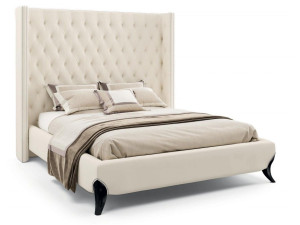 Двуспальная мягкая кровать из ткани с капитонным изголовьем