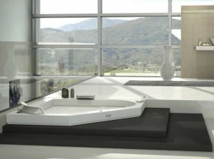 Jacuzzi® Угловая гидромассажная ванна из Corian® Aura